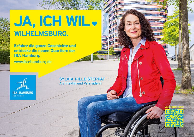 Sylvia Pille-Steppat im Rollstuhl, daneben der Slogan Ja, ich WIL. Außerdem ist das IBA Hamburg-Logo zu sehen